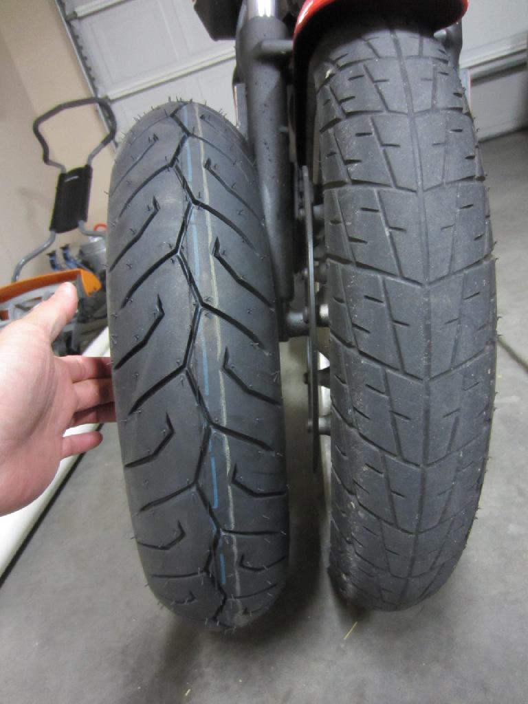 The Pirelli Diablo Scooter 110/70-16 front tire is about .5" wider than the stock Dunlop K330 100/80-16. (May 12, 2012) The Pirelli Diablo Scooter 110/70-16 front tire is about .5" wider than the stock Dunlop K330 100/80-16. (May 12, 2012)