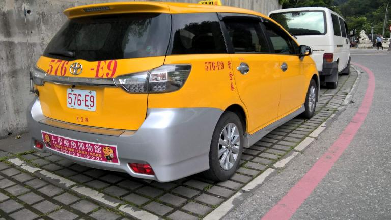 The Toyota Wind wagon was ubiquitous around Taiwan, especially as taxis. (April 29, 2016) yellow 2015 Toyota Wind