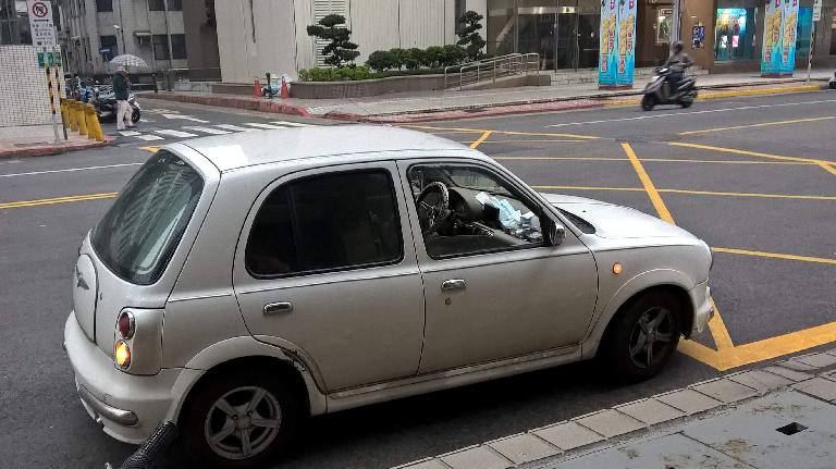 The Nissan March is ubiquitous in Taiwan. This white Nissan March is the Bolero version and offers 4WD. (April 30, 2016) white Nissan March Bolero