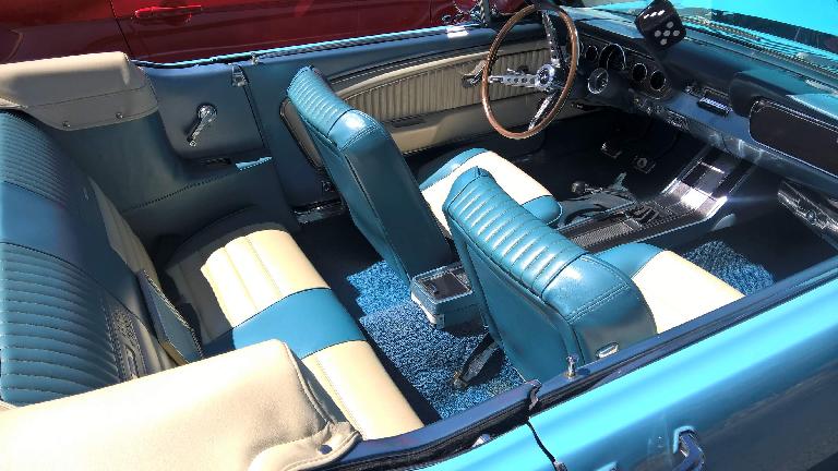 The interior of the 1966 Columbine blue High Country Special Ford Mustang convertible looked like it had more room than a contemporary Mustang convertible despite being smaller on the outside. The interior of the 1966 Columbine blue High Country Special Ford Mustang convertible looked like it had more room than a contemporary Mustang convertible despite being smaller on the outside.