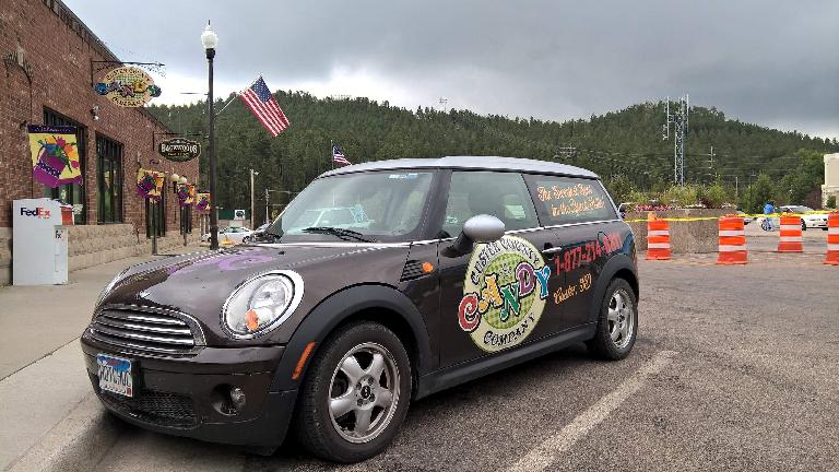 A brown Custer County Candy Company Mini Clubman. brown Custer County Candy Company Mini Clubman
