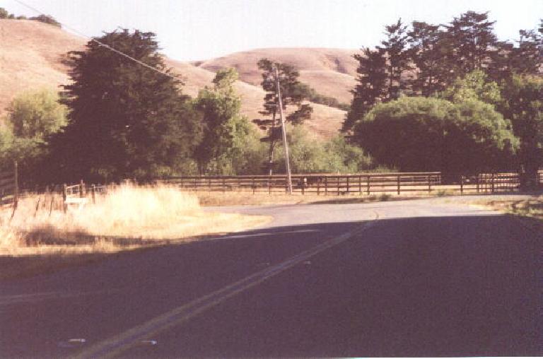Riding on winding roads by brown foothills during the 2001 Holstein Hundred. brown foothills, winding road, 2001 Holstein Hundred