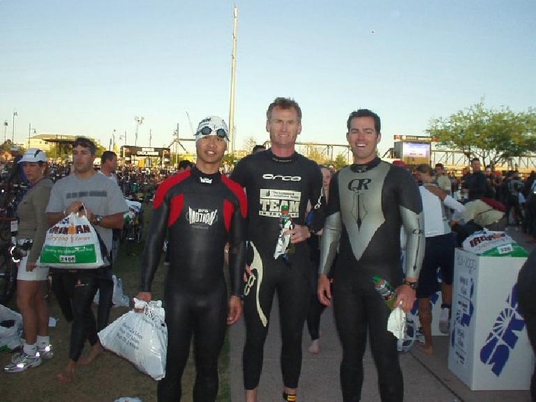 Felix, Bob, and Josh, now suited up in wetsuits with the 7:00am race start getting closer. Felix, Bob, and Josh, now suited up in wetsuits with the 7:00am race start getting closer.