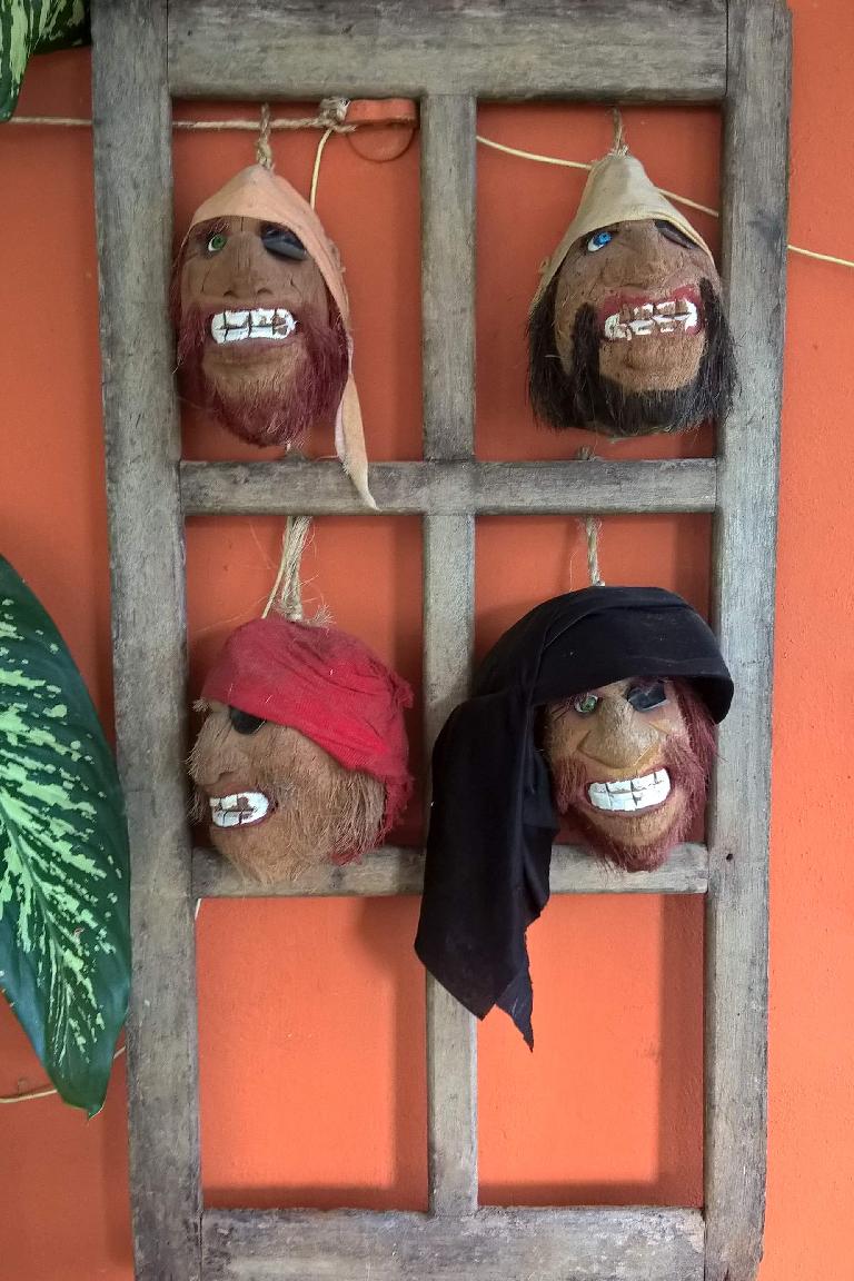 Coconut masks at Bahama Mama restaurant in Isla Mujeres. coconut masks, Bahama Mama restaurant, Isla Mujeres