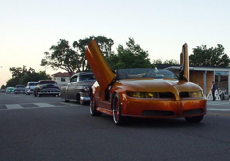 Though 95% of the cars were customized cars from the 50s, there was this custom 2005 Pontiac GTO with flip-up doors. Though 95% of the cars were customized cars from the 50s, there was this custom 2005 Pontiac GTO with flip-up doors.