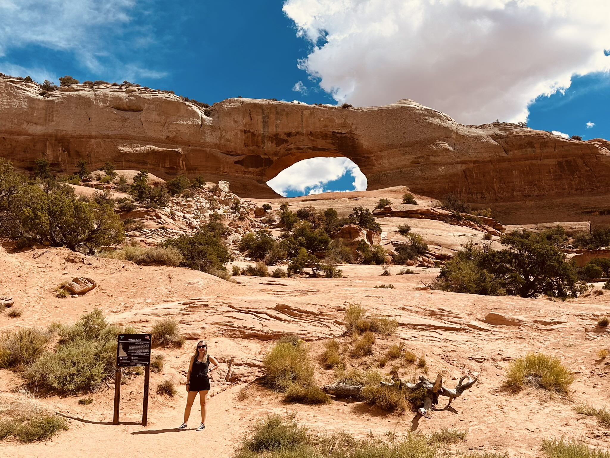 Andrea at Wilson Arch in Monticello, Utah.