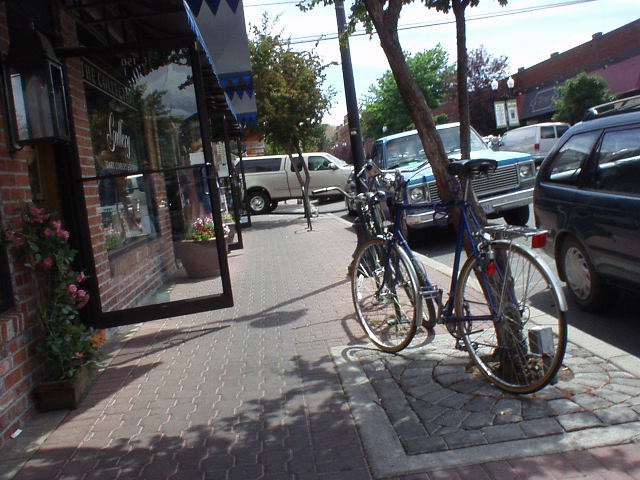 Here's a pic of a street in downtown Bend (sorry, this is the best I got so far).  There is starting to be a fair amount of ethnic restaurants along with some high-end ones and lots of boutique/mountain sports shops.  Lots of people bike here, and parking isn't bad!