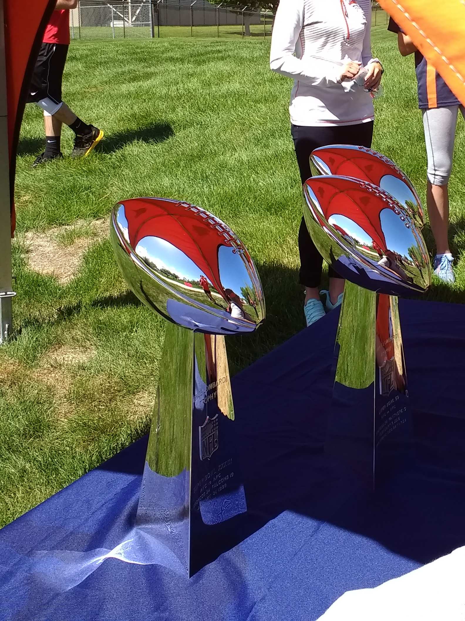 The Denver Broncos three Super Bowl trophies.