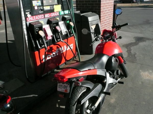 Filling up my Buell Blast with gas.
