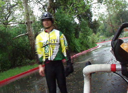 [Mile 26, 6:51 a.m.] Felix Wong at the first checkpoint, fairly comfortable despite being drenched in several torrential downpours already.