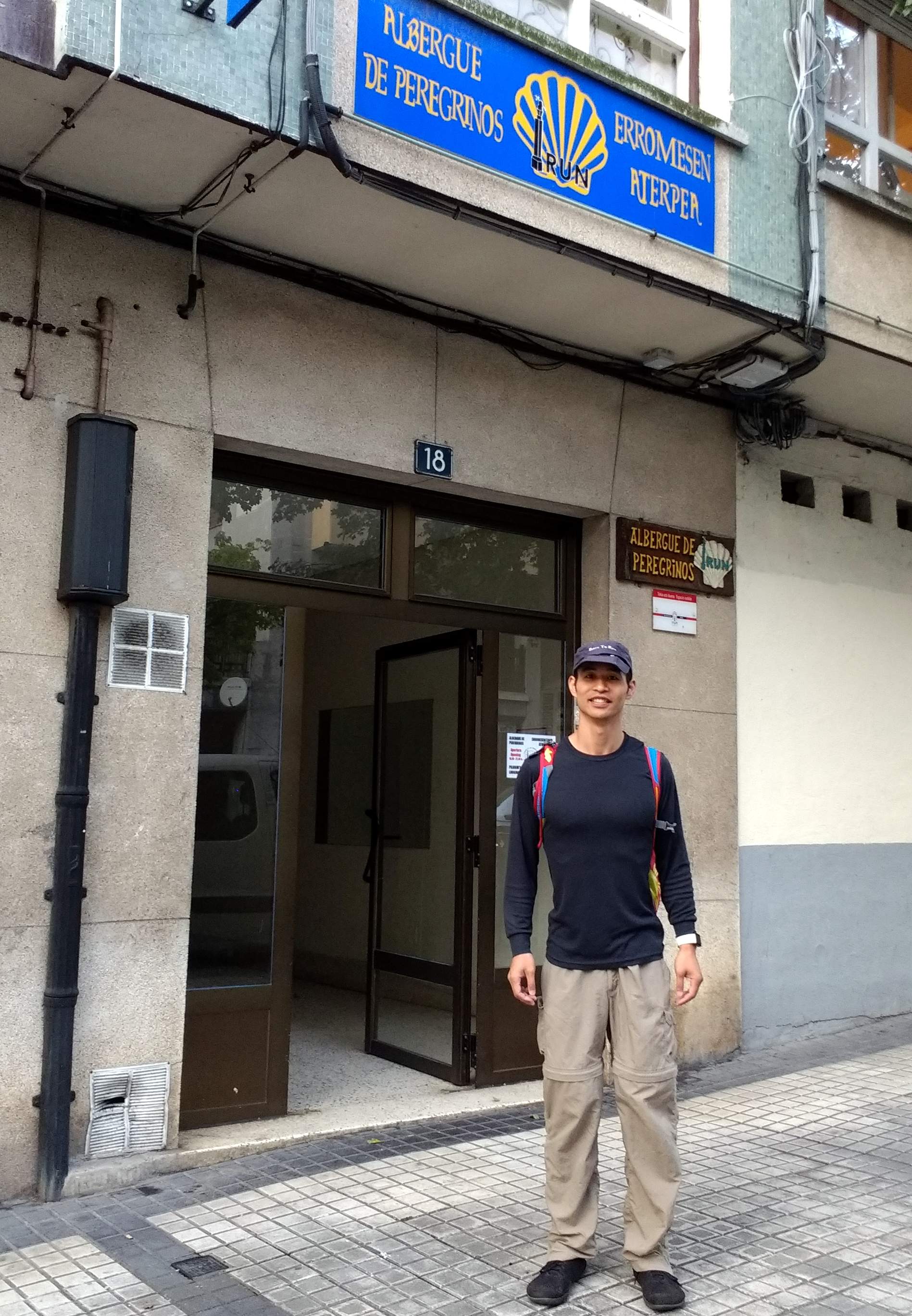 Felix Wong starting the Camino de Santiago outside an albergue in Irún, Spain.