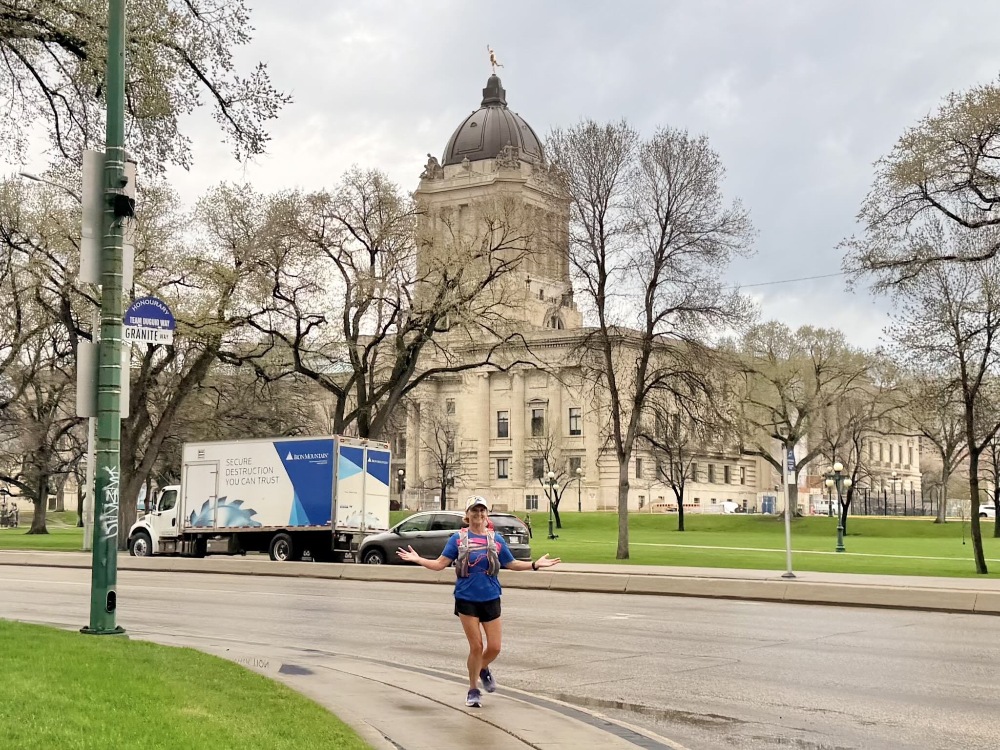 Mel running by the Parliament Building in Winnipeg, Manitoba.