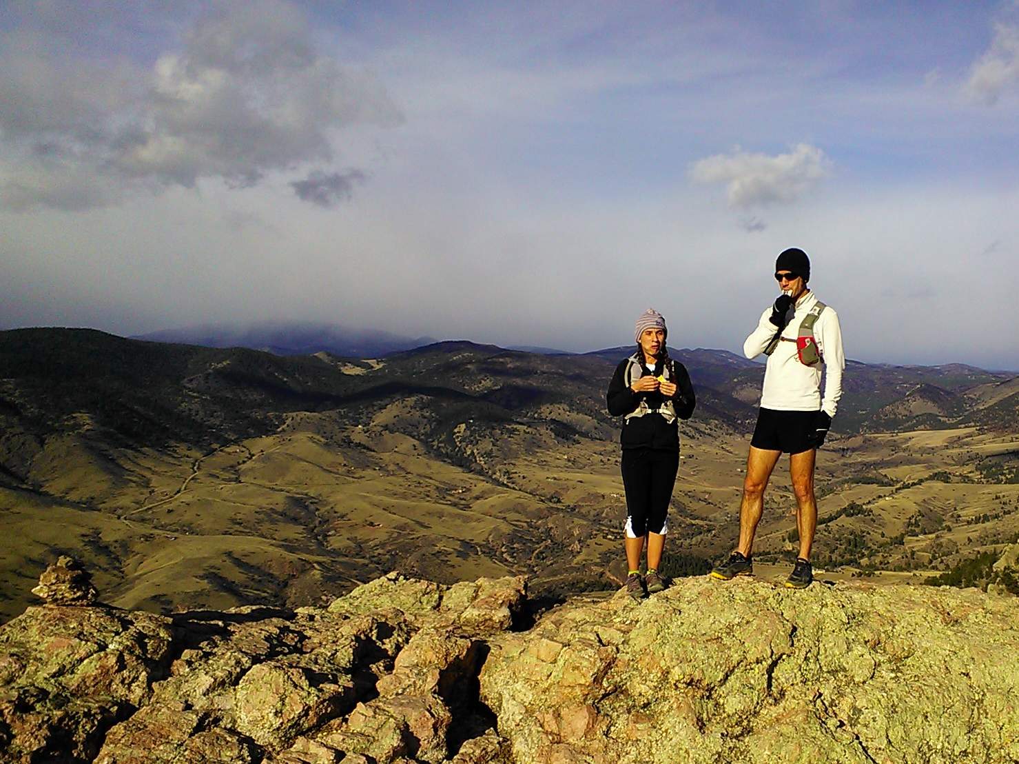 [Mile 3.5] Victoria and another runner at the top of Horsetooth Rock taking a quick food break.