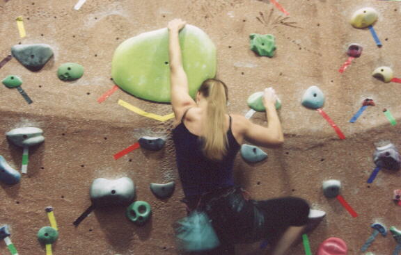 Photo: Sharon on the advanced boulder problem.