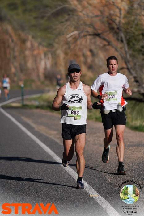 Felix Wong running down the Poudre Canyon in the 2019 Colorado Marathon.