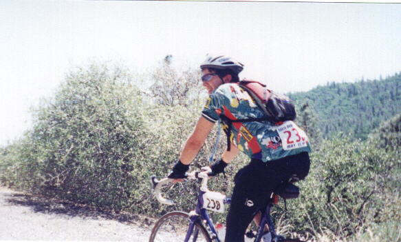 Daniel Lieb riding up Big Canyon while singing during the 1999 Davis Double Century.