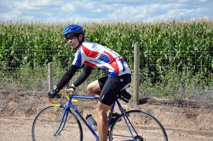 Felix Wong riding by the cornfields northwest of Wellington.