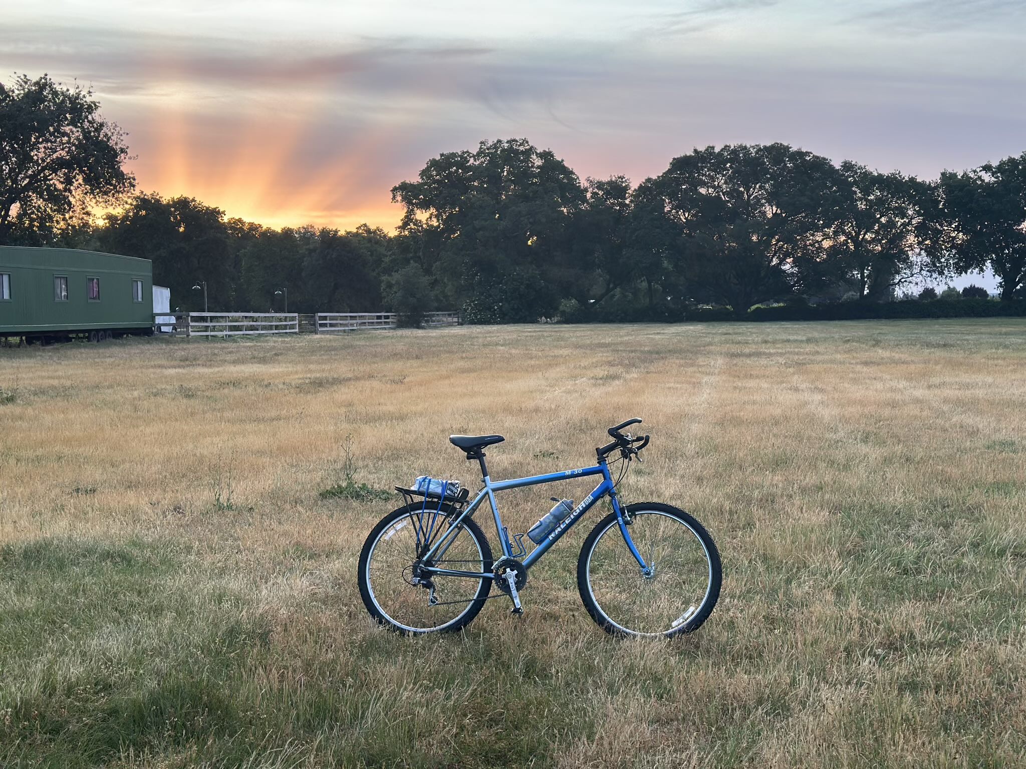The 33-pound Raleigh M-30 mountain bike, with a sunrise in the background, at Jessie's Grove Winery.