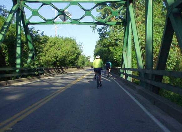 green bridge, cyclist, Delta Century