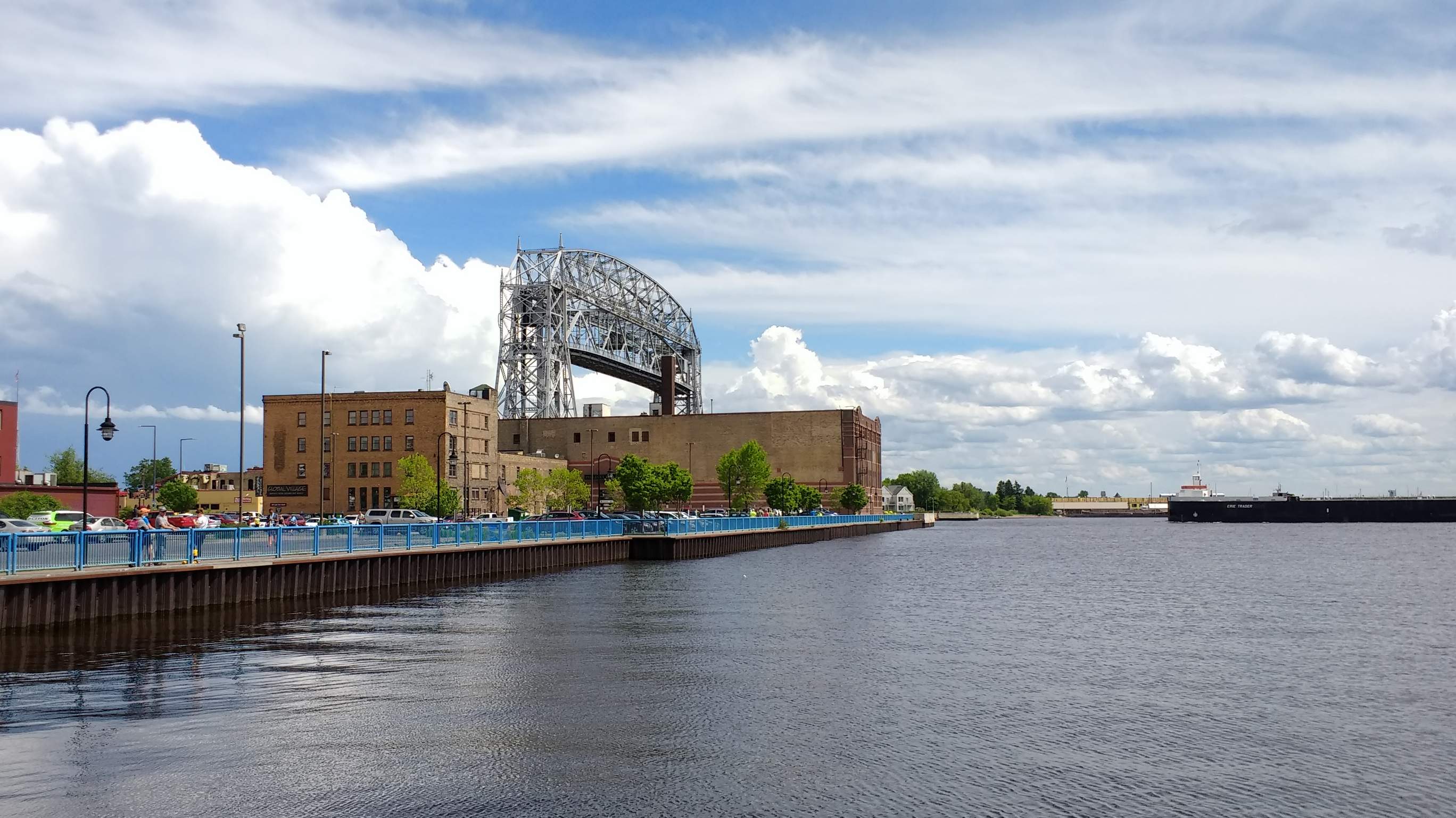 A long ship about to pass under the Aerial Lift Bridge in Duluth, Minnesota.
