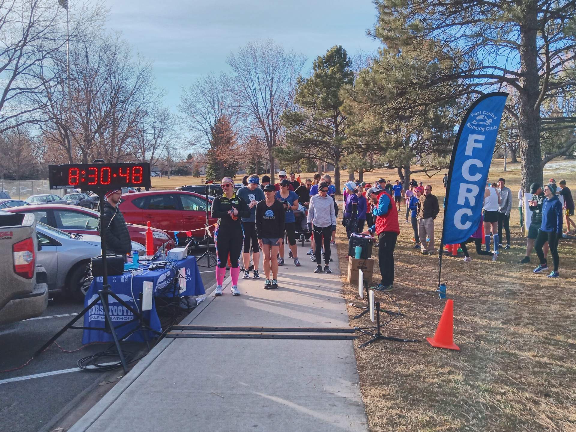 Runners line up for the 8:31 a.m. wave of the 2020 Edora Park 8km Tortoise & Hare race put on by the Fort Collins Running Club (FCRC).