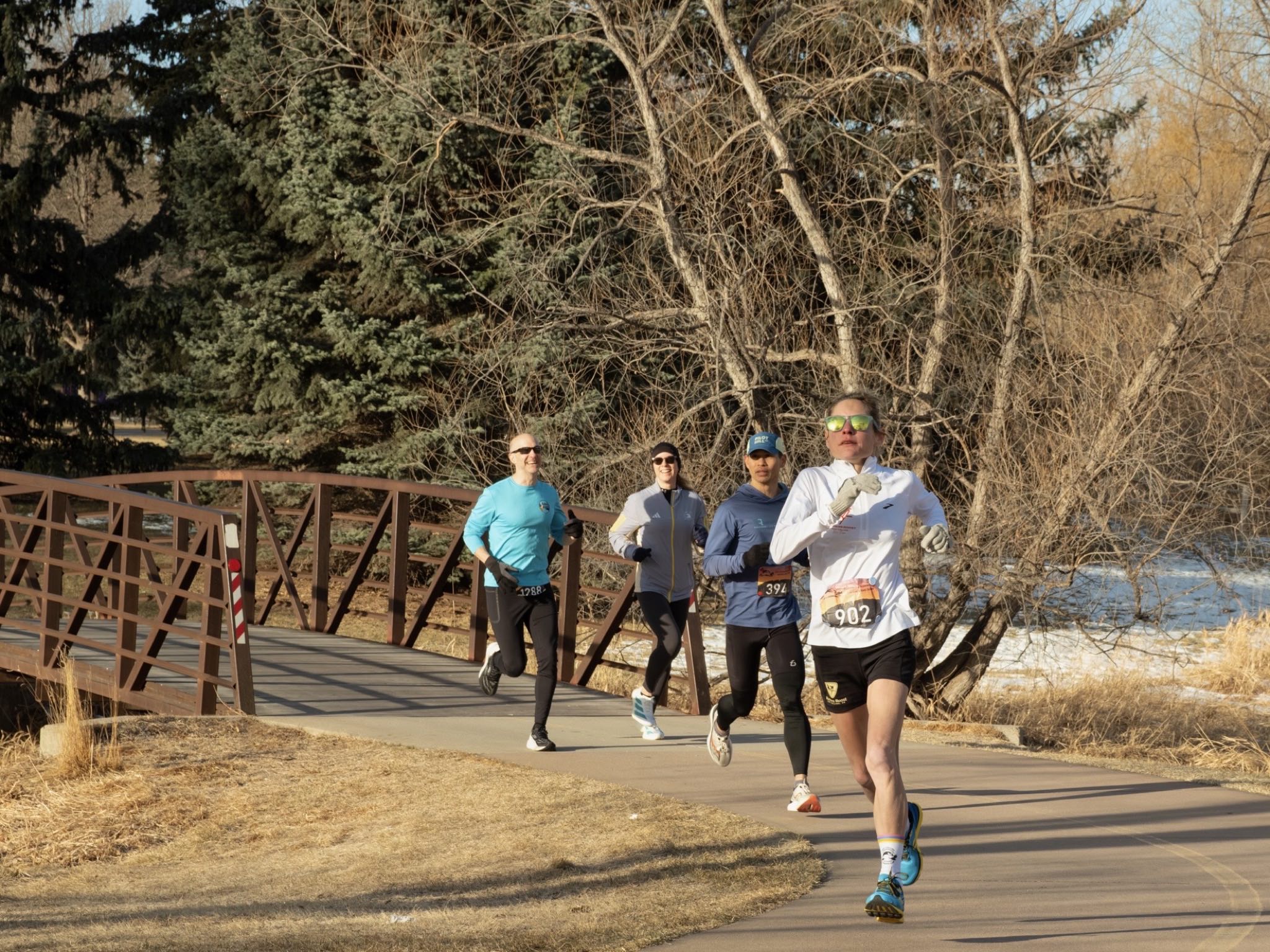 Runners in my wave crossed a bridge a couple of minutes after starting. I'm the one in the blue shirt and hat.