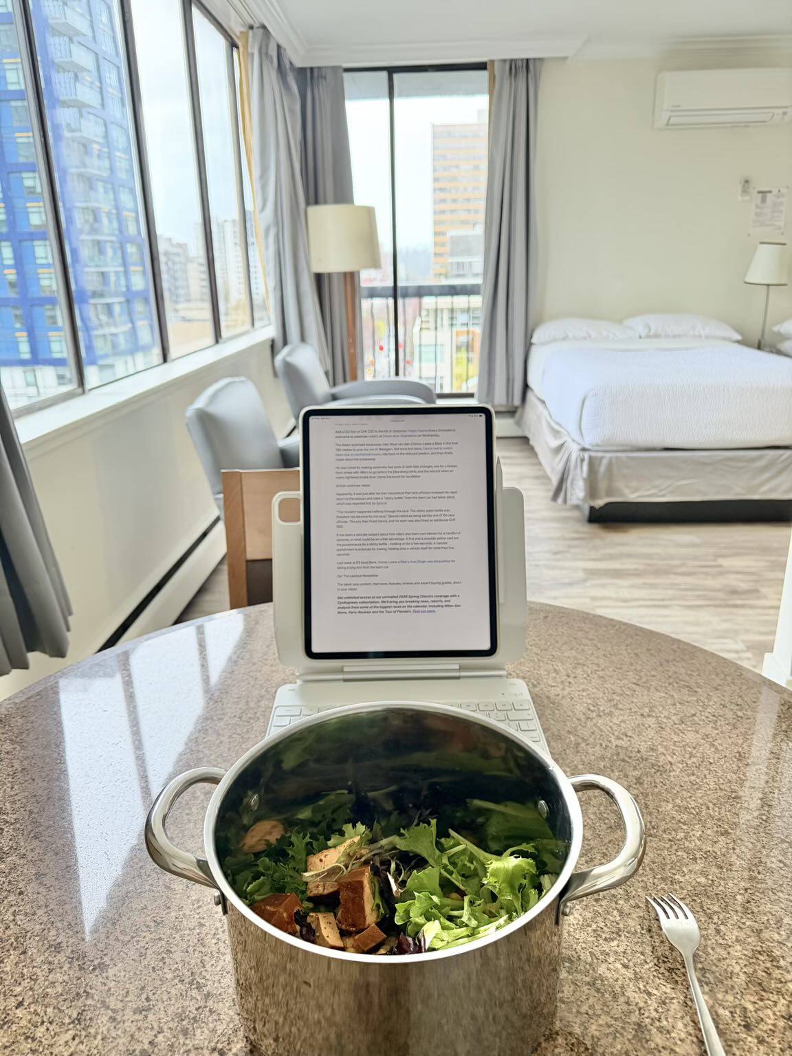 Reading an article on my iPad Pro 12.9 in portrait orientation while eating a huge salad in my Hotel Opportune room in Vancouver, British Columbia.