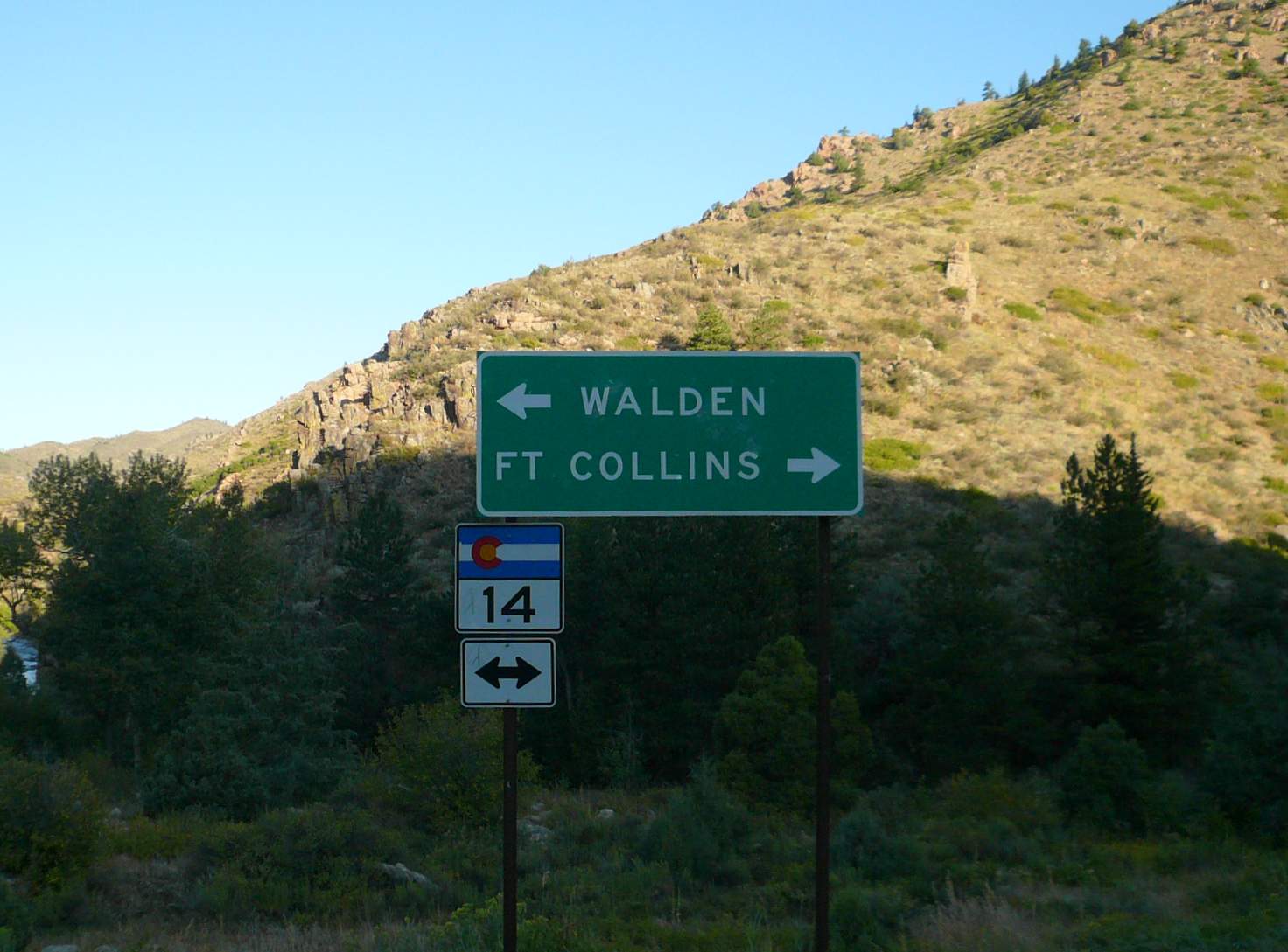[Mile 27, 7:33 a.m.] Signage to Walden and Fort Collins.