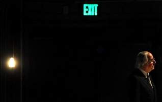 Frank Abagnale, EXIT sign in darkness