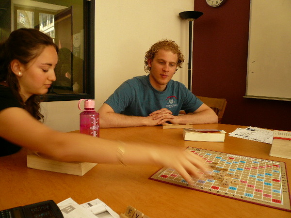 young woman and young man playing Scrabble