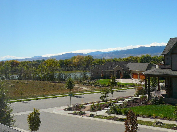 Another view of Richards Lake, nice homes and the foothills (including Horsetooth Rock and Longs Peak) from my home in Fort Collins.