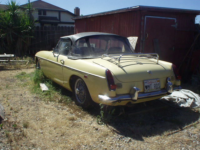 My yellow 1969 MGB stored at my dear friend Frank's home in 2006.
