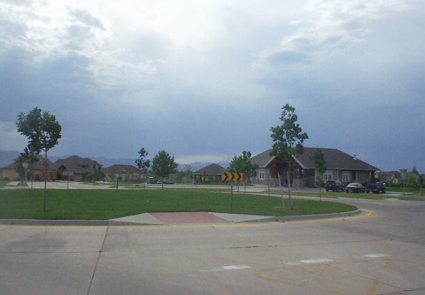 The roundabout and clubhouse for Hearthfire at Richards Lake.