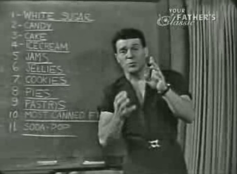 Jack Lalanne in front of blackboard listing 11 things you should not eat