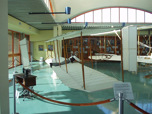 This is a replica of the one of the gliders the Wright brothers created years before creating their self-powered airplanes.  The gliders enabled them to master flight control.