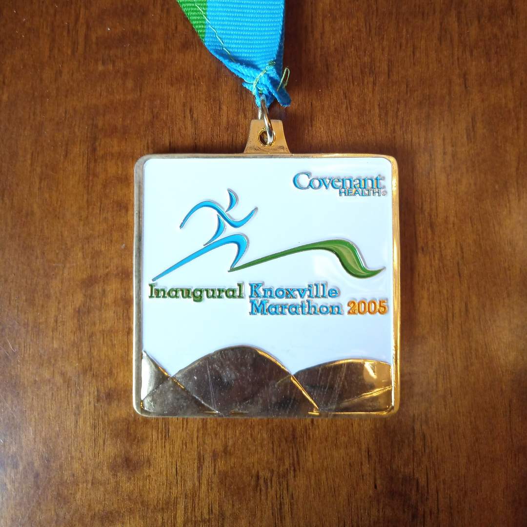 white medal that says Inaugural Knoxville Marathon 2005, Covenant Health