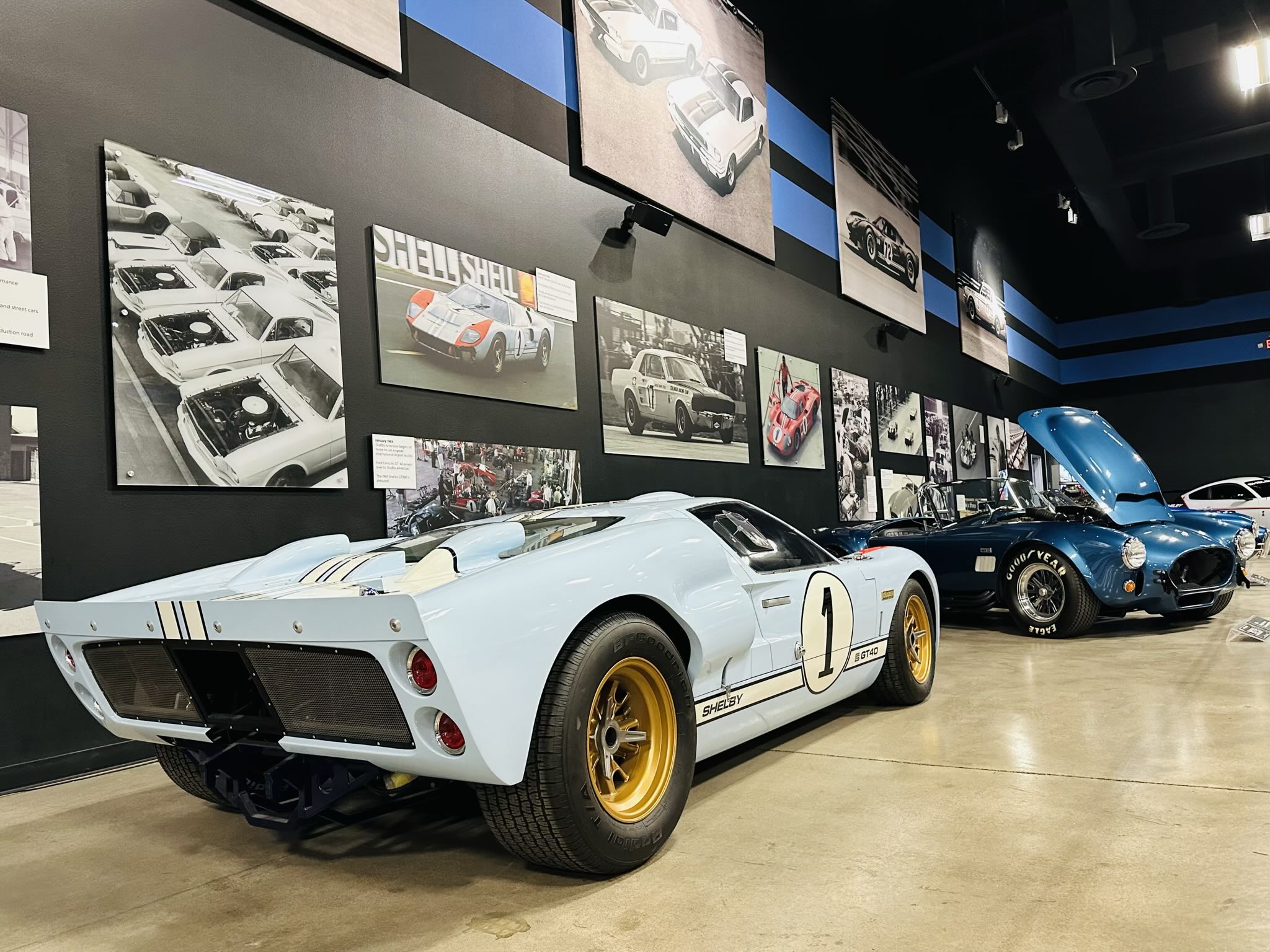 A baby blue Ford GT40 and a 1968 Shelby Twin Paxton Supercharged 427 Cobra.