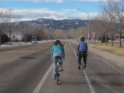 Kelly and Dave riding towards Horsetooth Rock.