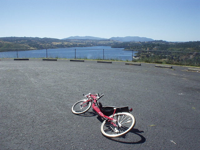 [Mile 40, 9:59 a.m.] My recumbent takes a well-deserved break at a surprise water stop overlooking the Pardee reservoir upstream of Lake Camanche.