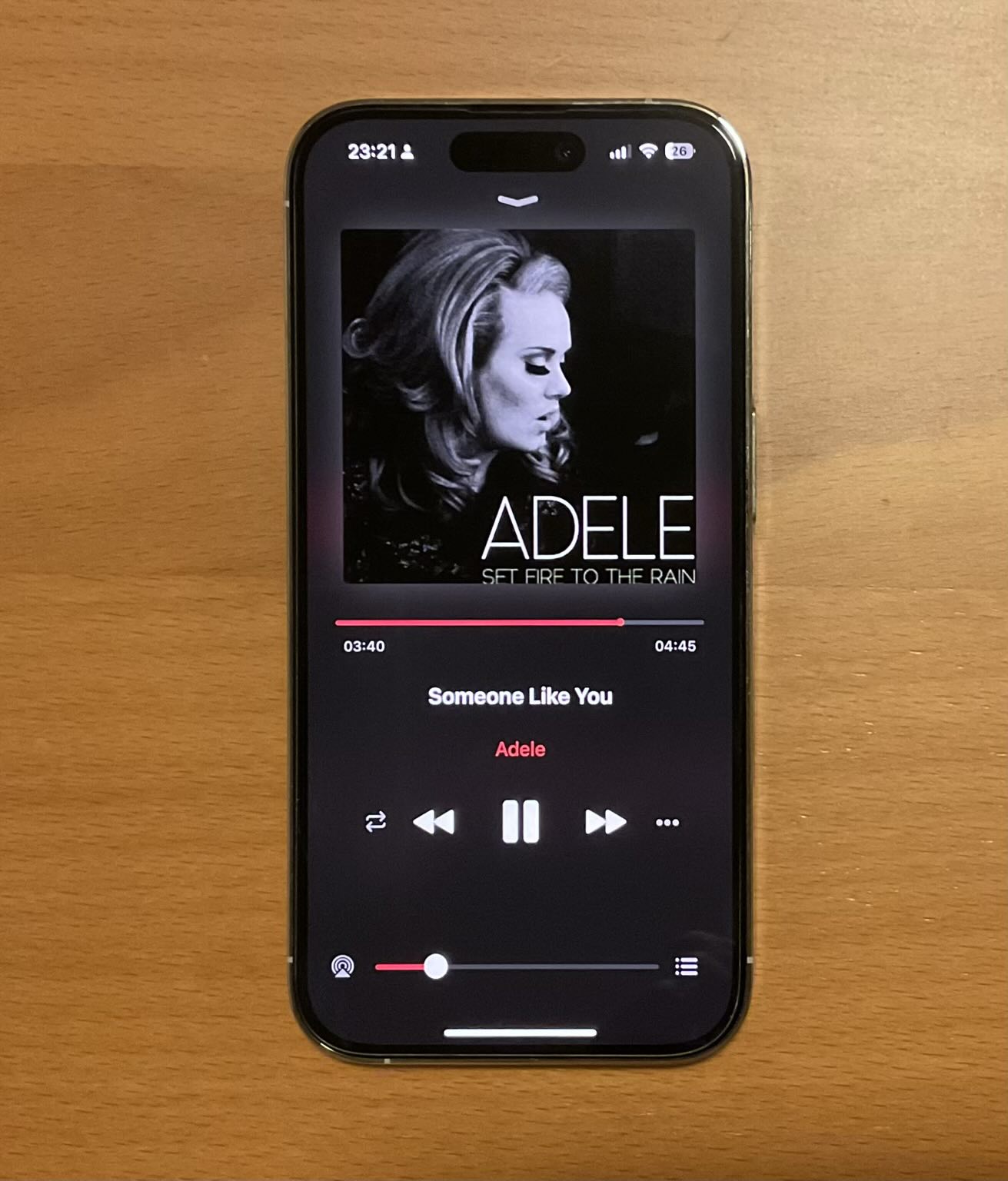 Playing a song by Adele using the Melodista app on an iPhone 14 Pro.