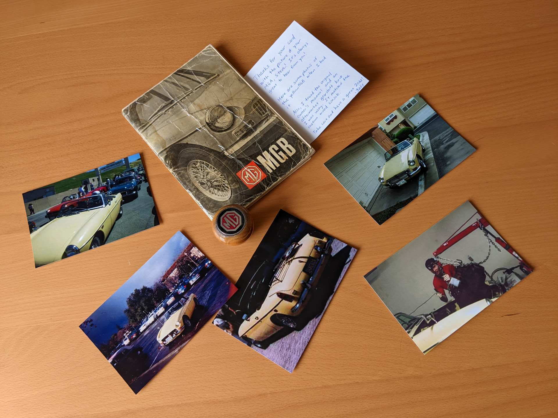 The wood MG gearshift knob, original MGB handbook, card and photos I sent Steve, the current owner of my former yellow MGB.
