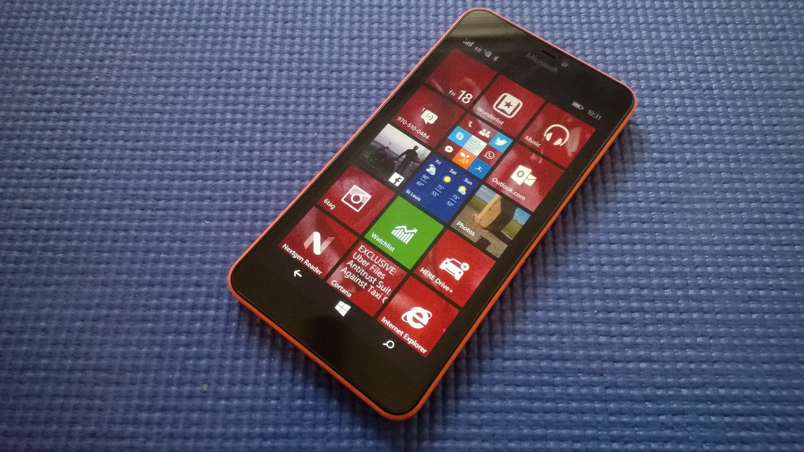 orange Microsoft Lumia 640 XL, blue yoga mat