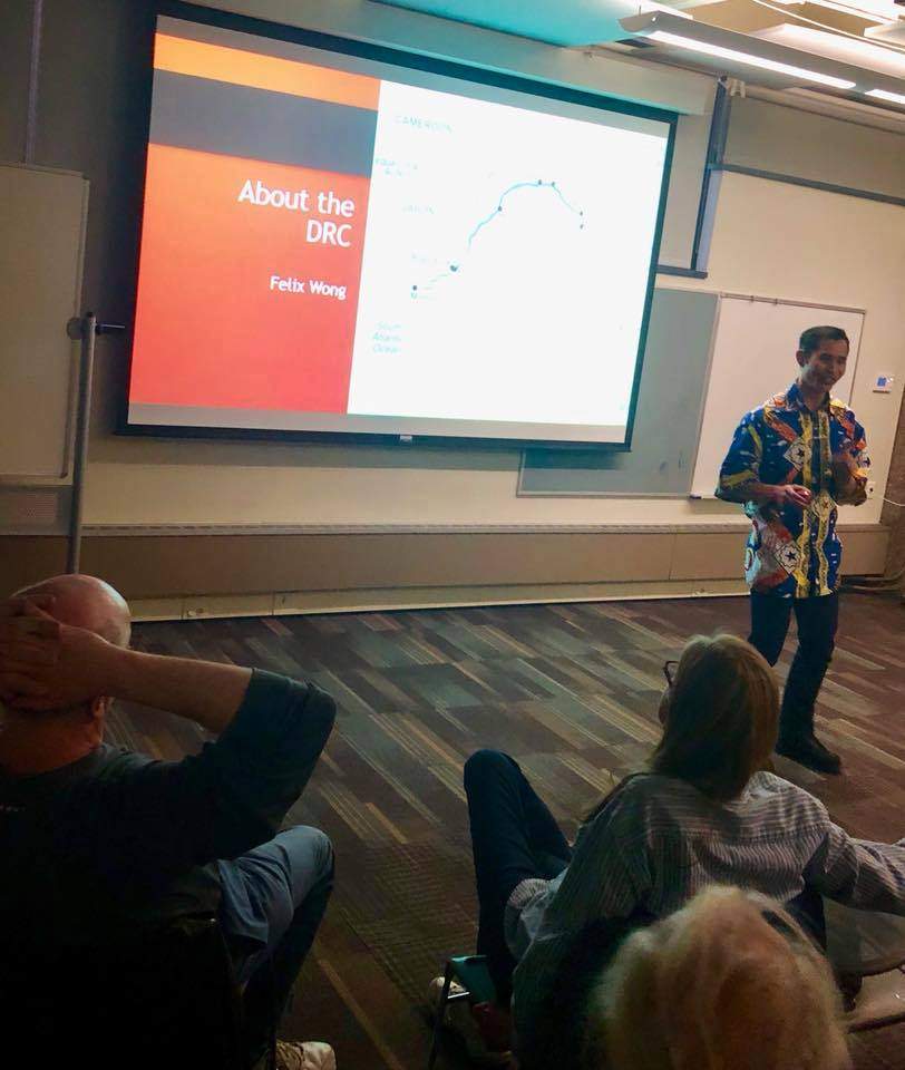 Felix Wong giving a presentation at the Old Town Library in Fort Collins about the Democratic Republic of the Congo.