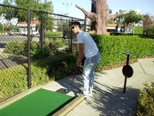 Tiger Woods, here I come.  Felix Wong and his clearly superior putting skills (haha again).