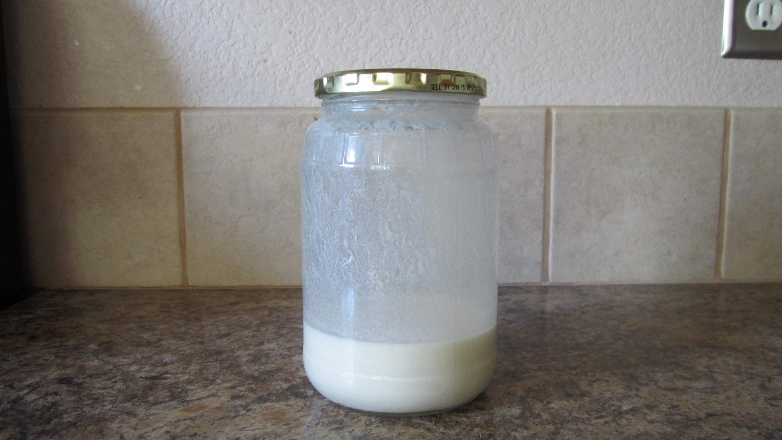 mixing protein powder in a jar