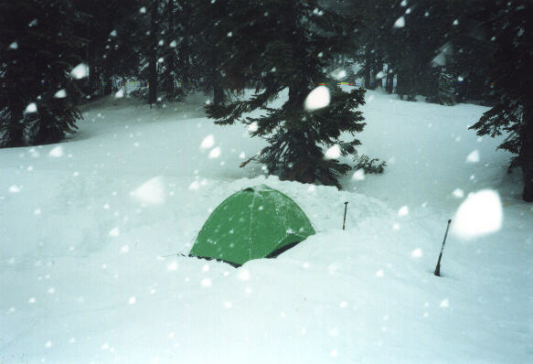 Snow camping.  We built snow walls around the tent to help shield it from the wind.  The snow really came down during the night.