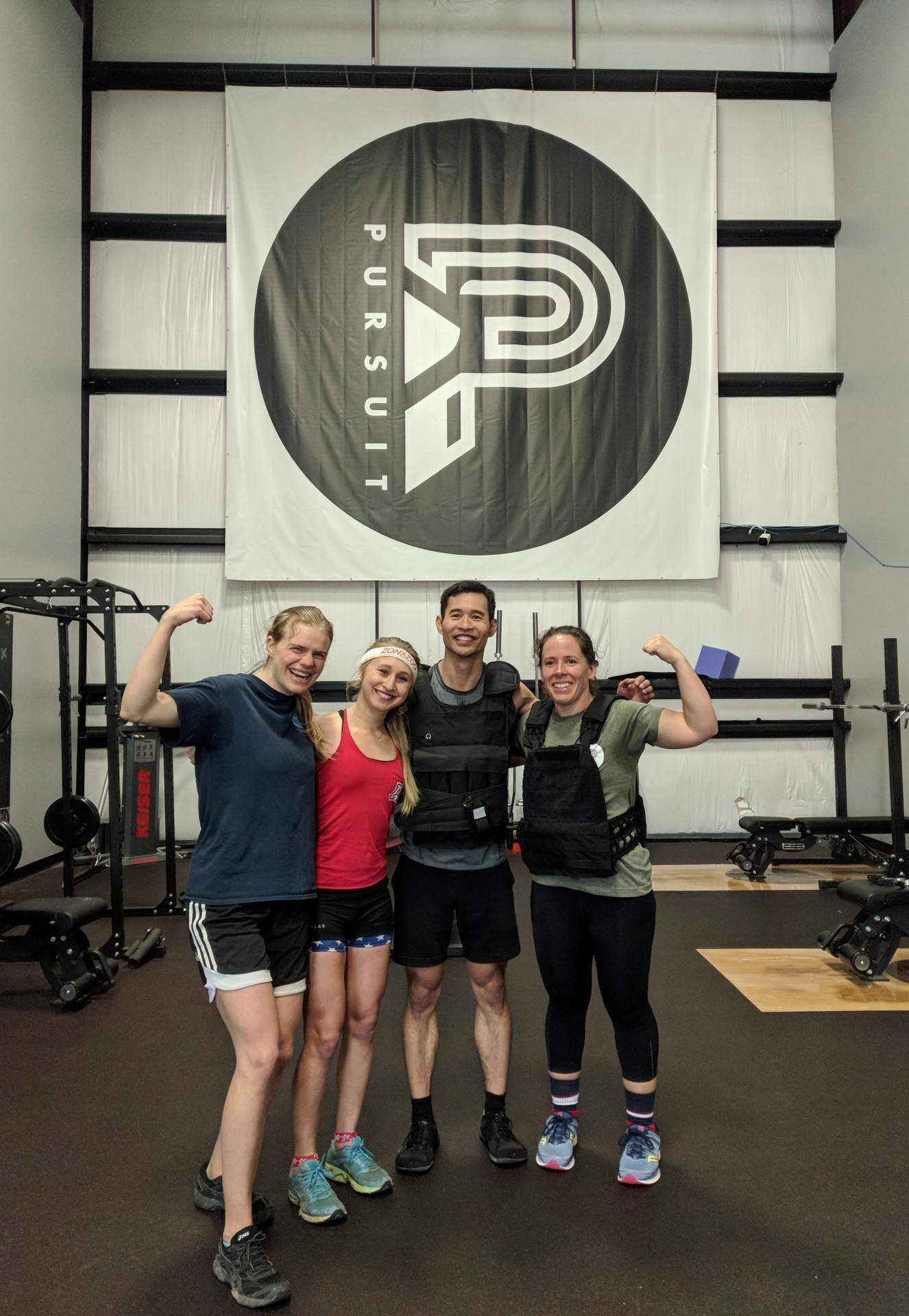 Evelyn, Emily, Felix, and Jennifer after completing the Murph Challenge.
