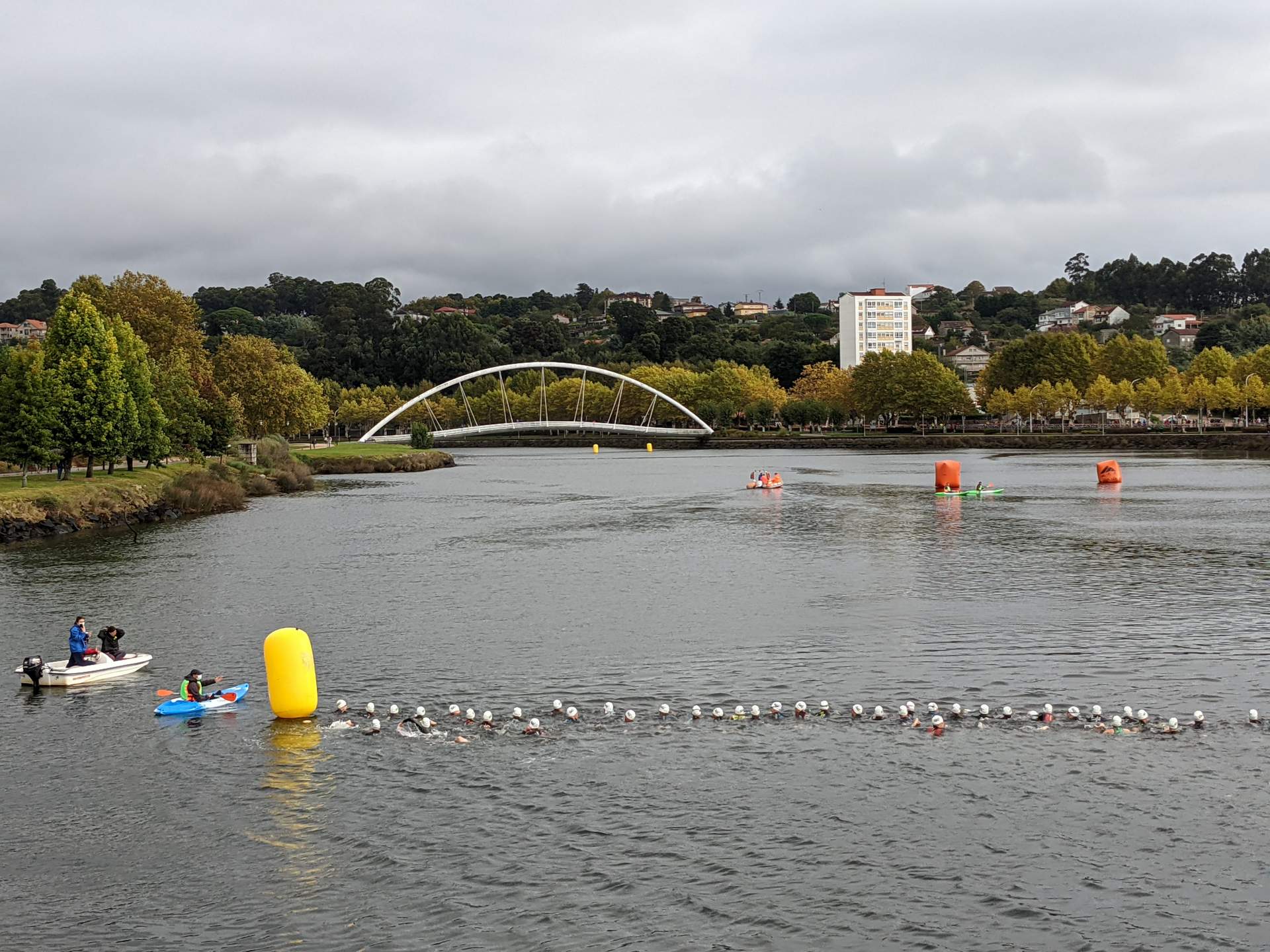 Triathletes in the Lérez river in Pontevedra right before their 250-meter swim during the National Sprint Triathlon Championship in Spain.