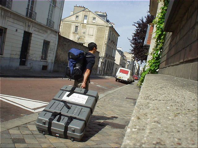 [2 days before the race] Here I am lugging my bike case from the Versailles-Chantiers RER stop to L'Hotel Home St. Louis in Versailles.  I felt I got a lot of exercise before the race with all the bike case lugging!