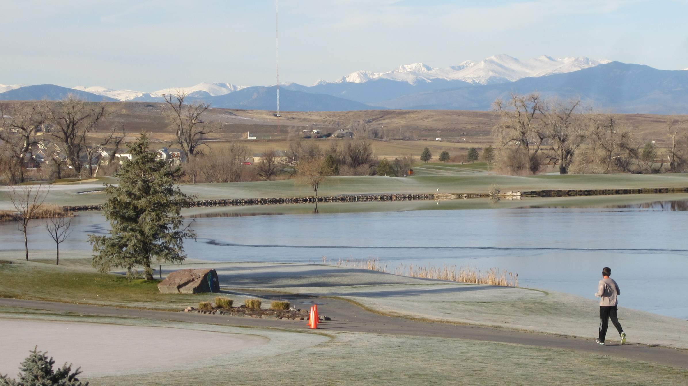 A runner enjoys the astounding views of the Pelican Lakes Turkey Trot 5k.